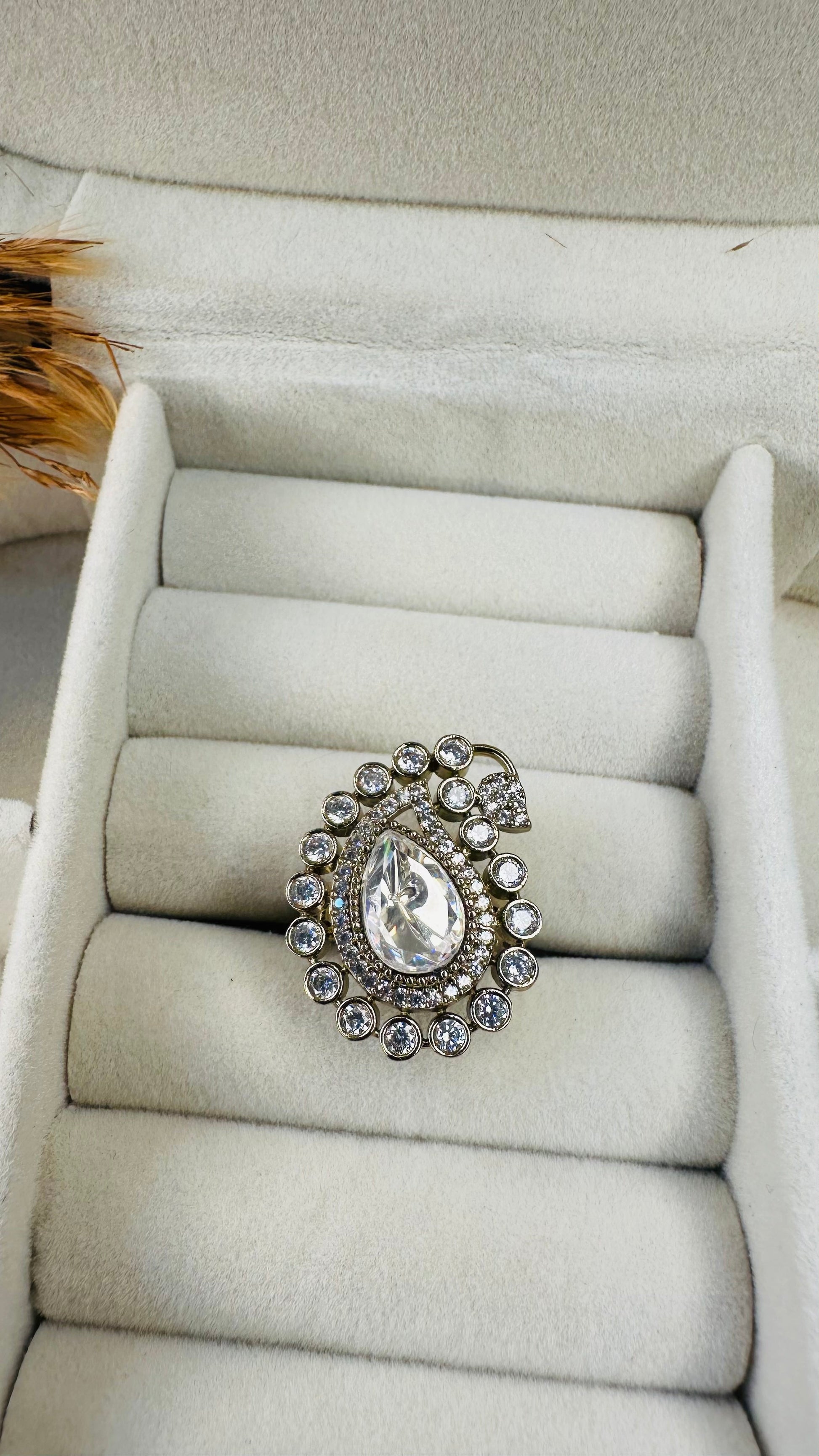 Side closeup large stone American diamond ring