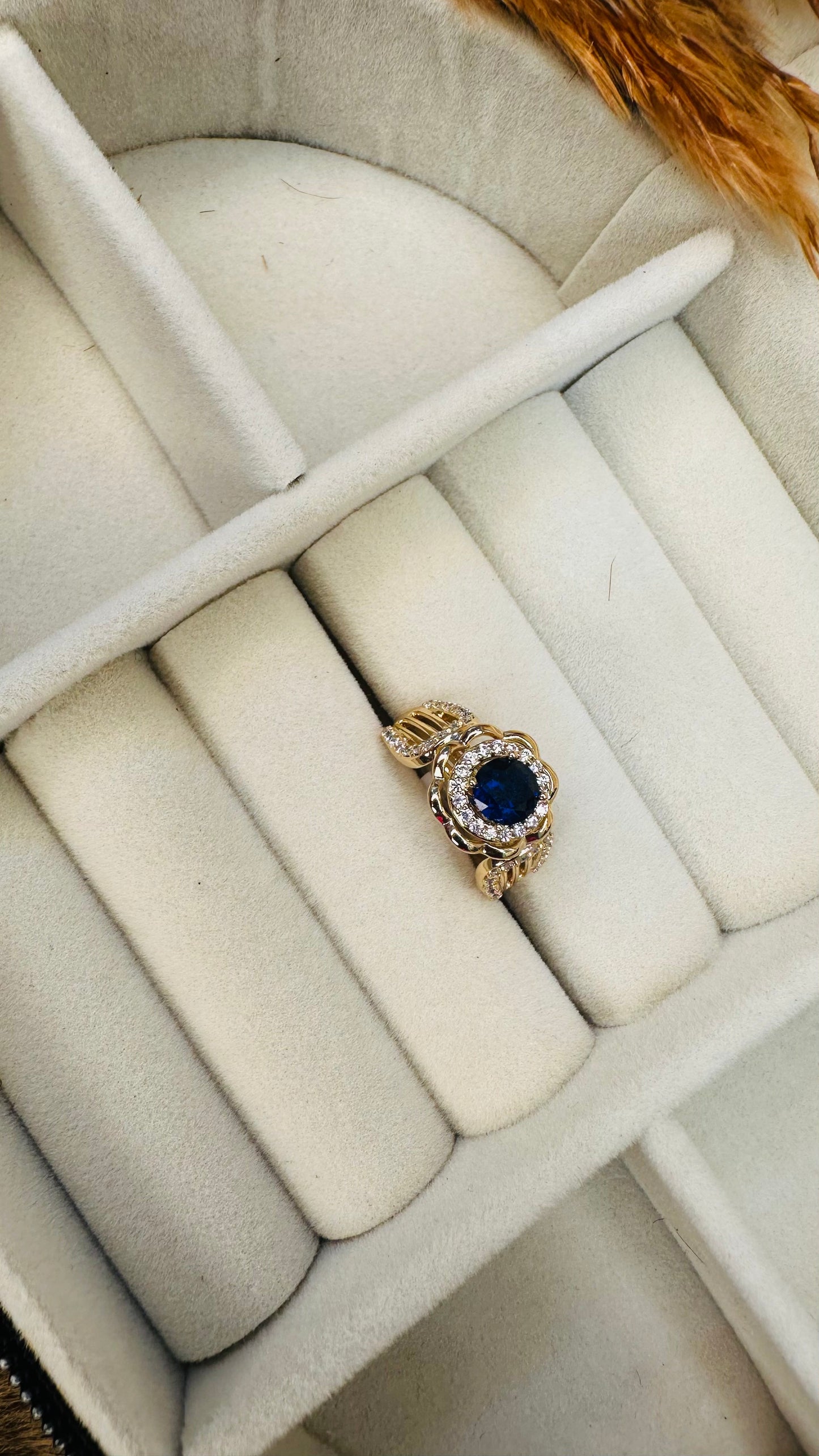 Blue sapphire floral halo gold ring