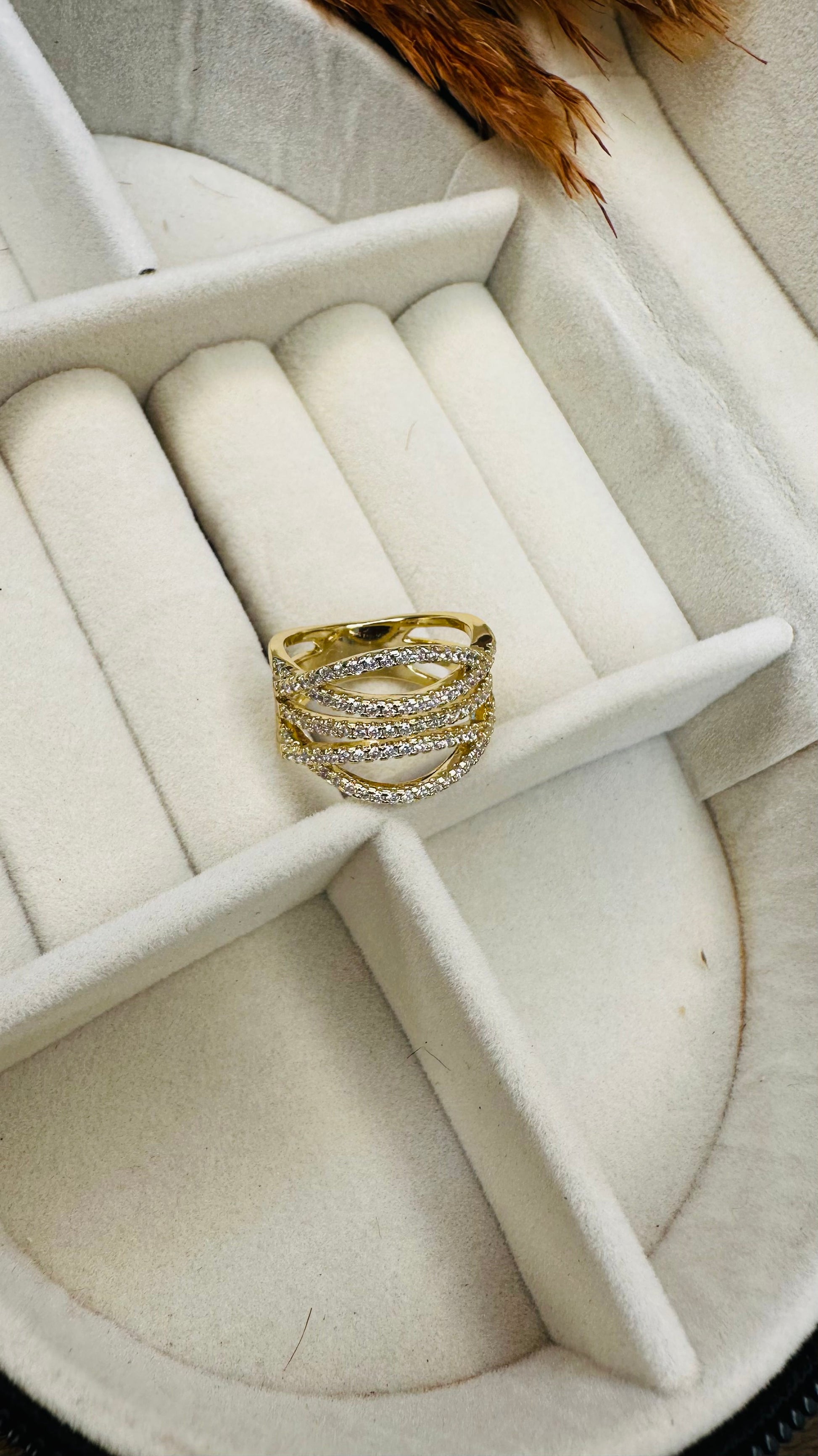 Criss cross pavé gold statement ring