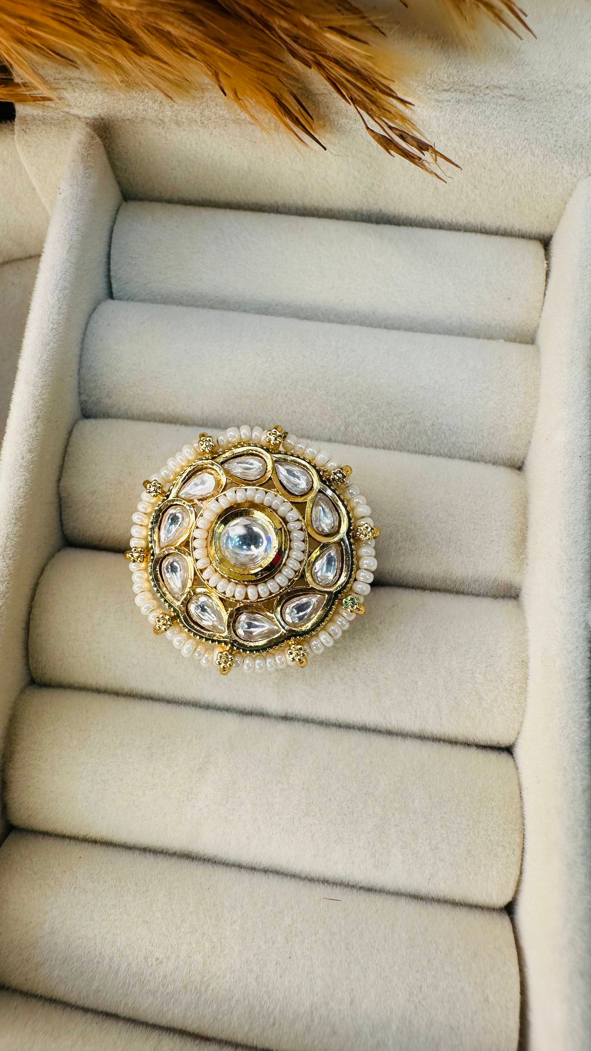 Layered floral kundan emerald cocktail ring Hey Bae