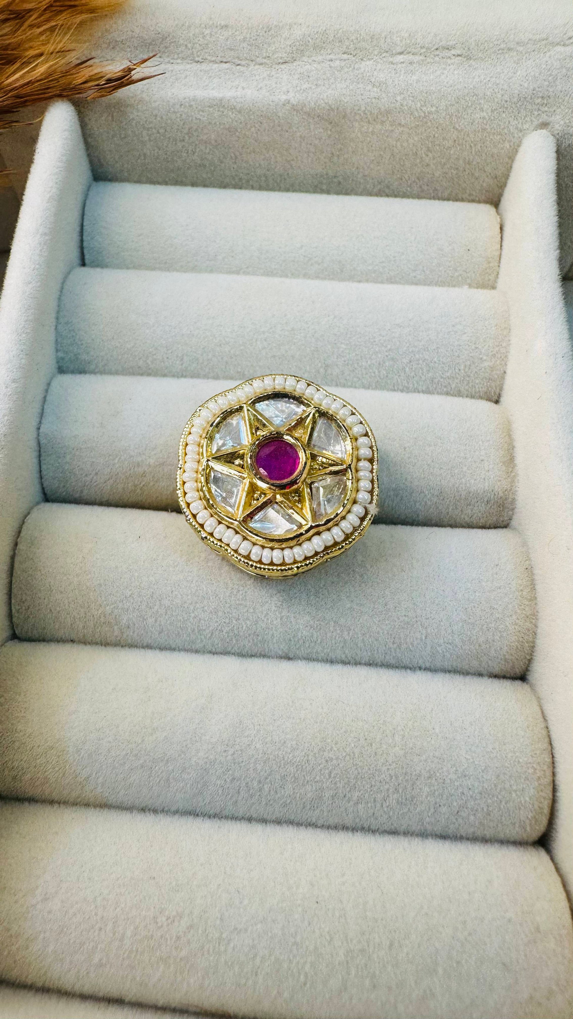 Side view pink center star kundan ring