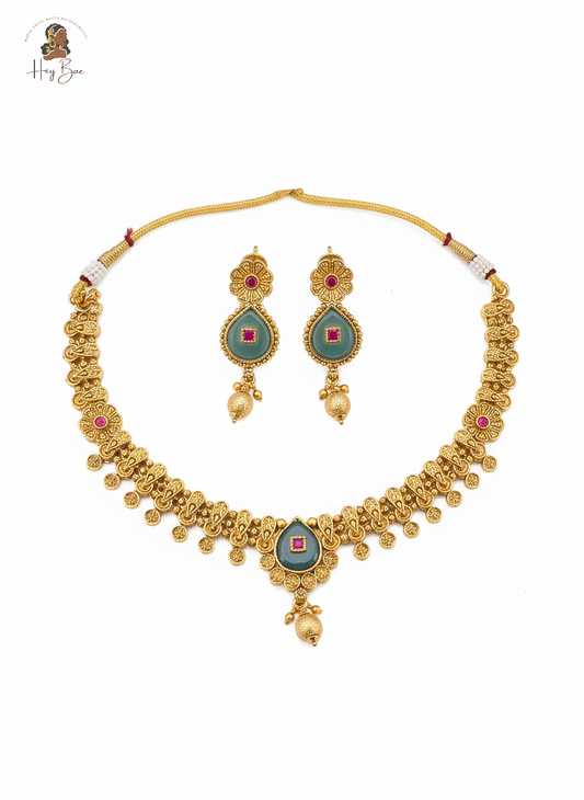  HeyBae antique gold necklace set with teal and ruby stones with gemstones on a white background