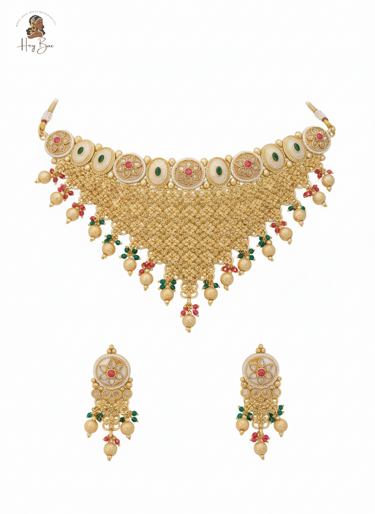 Gold necklace with floral elements on a white background