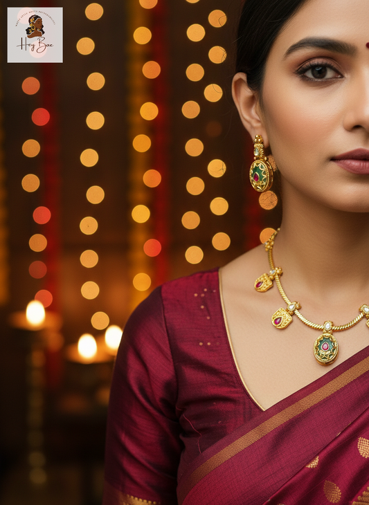 Woman wearing  Hey Bae royal antique gold necklace set with ruby and green stones  with a blurred festive background