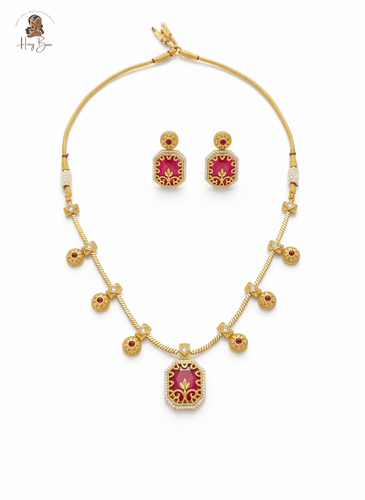 Hey Bae ruby red and gold geometric necklace set on white background