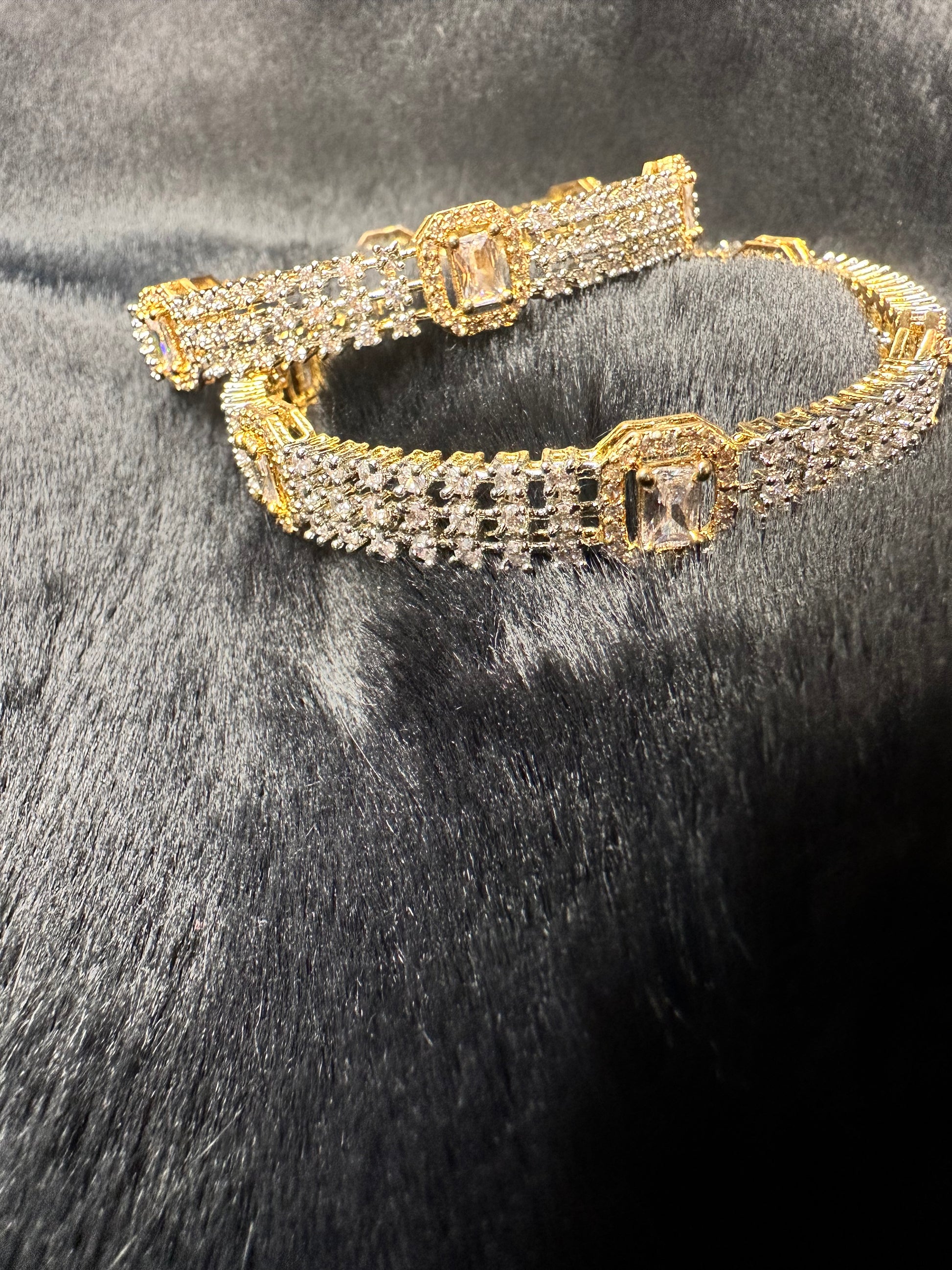 Gold-plated American Diamond bangles set of 4 with intricate square-cut stones