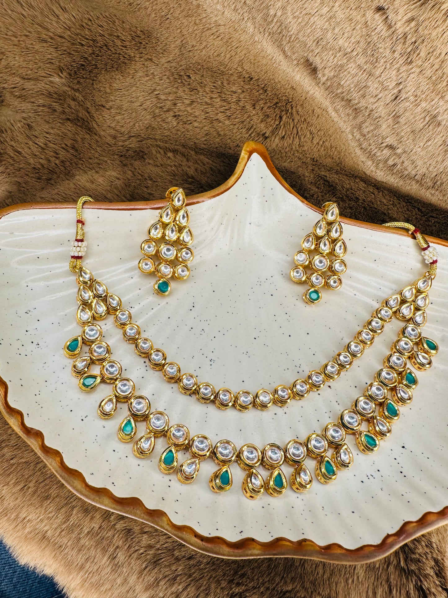 Layered kundan with green drop detail