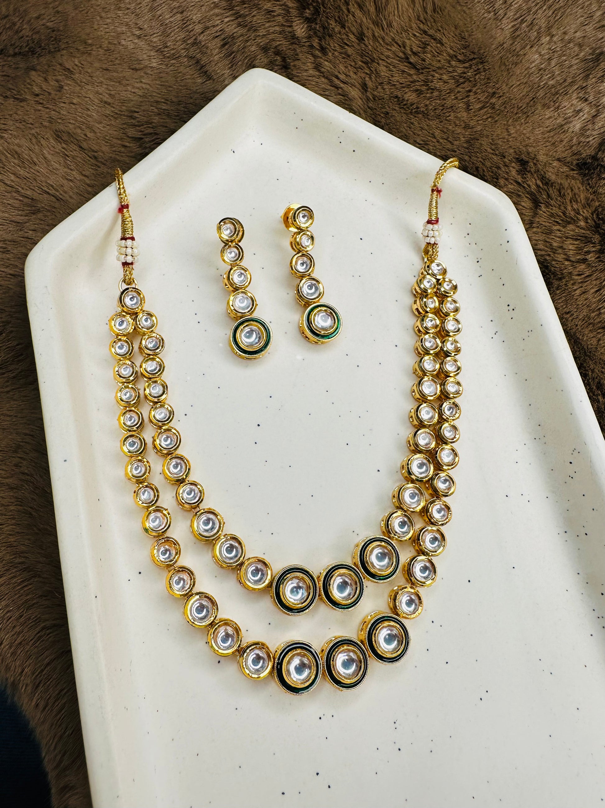 Necklace + earrings side placement