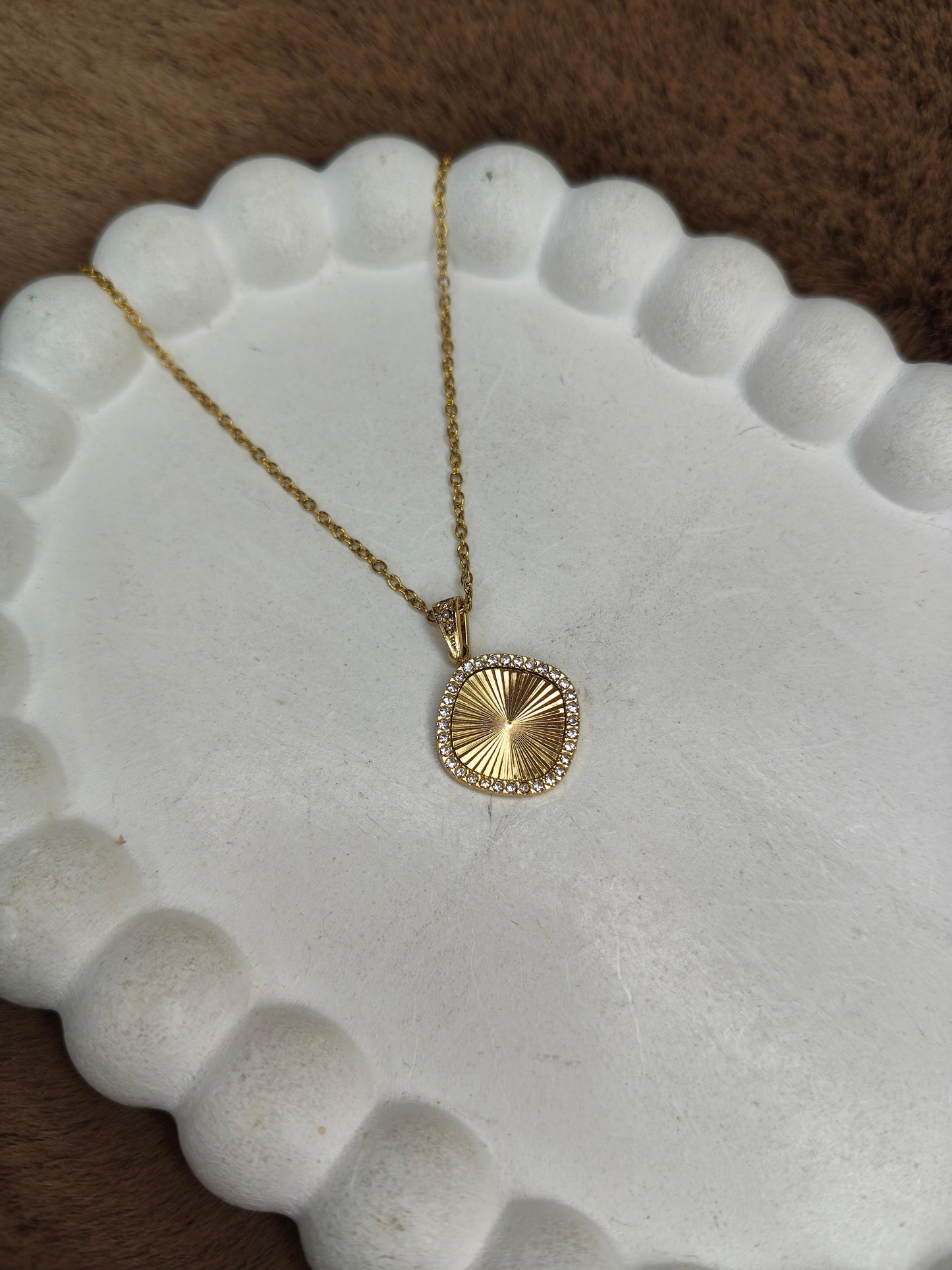 Radiant Sunburst Crystal Pendant
