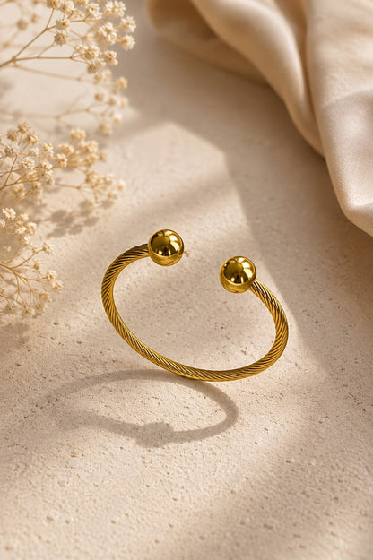 Golden Twist Orb Cuff Bangle
