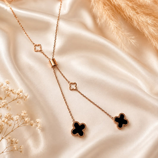 Clover Lariat Necklace – Black & Gold Four Leaf Charm Pendant