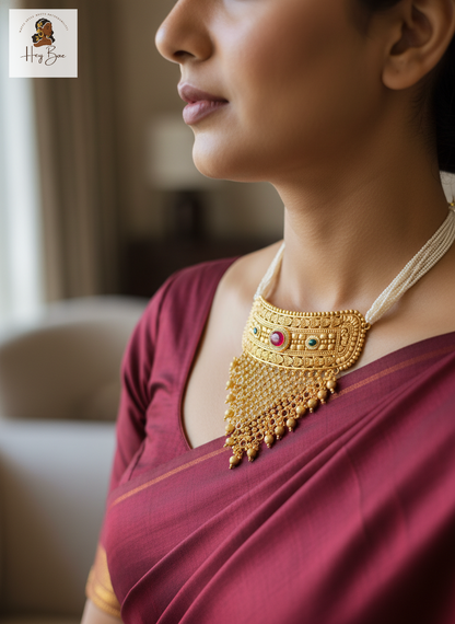 Woman wearing antique gold choker necklace on silk saree styling inspiration.