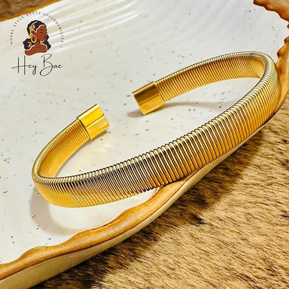 Adjustable women’s gold Kada bracelet styled with casual wear
