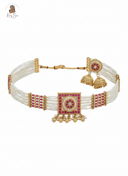 Royal Ruby Pearl Choker Set with Jhumkas - Gold Plated on a white background
