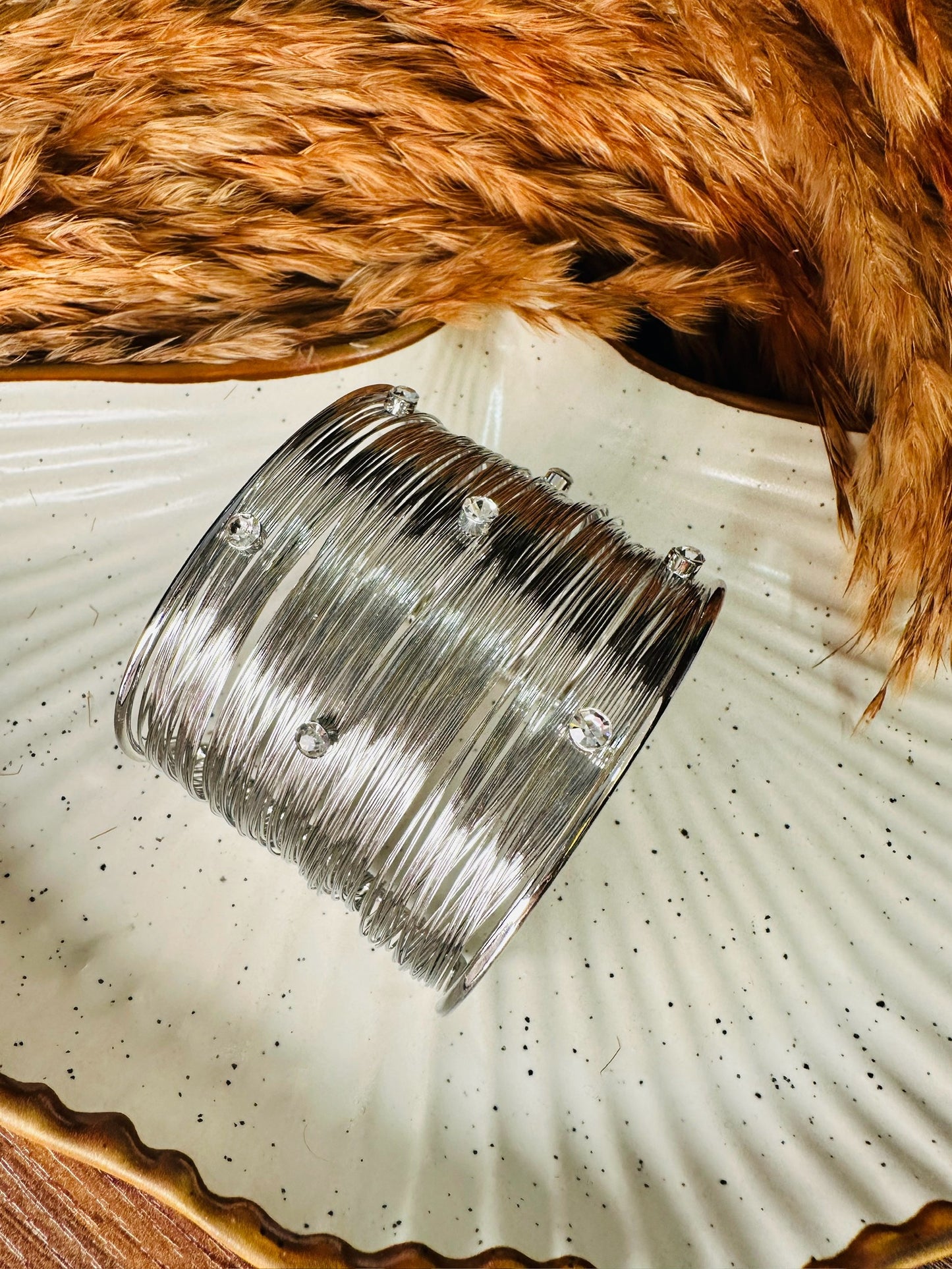 Silver ethnic bangles set styled on hand for traditional wear