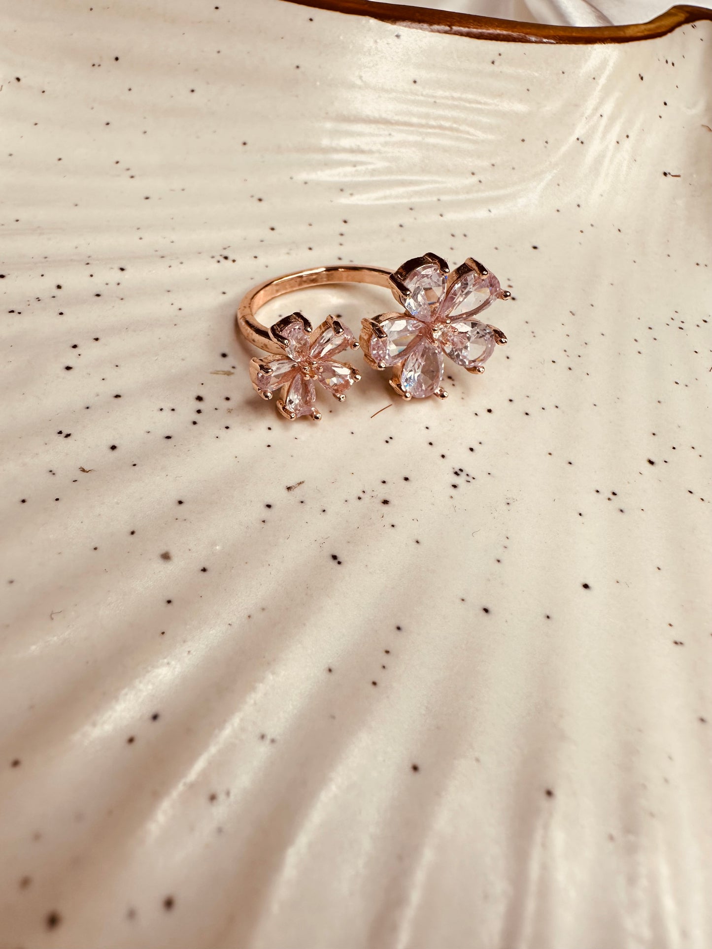 Side view of HeyBae American Diamond Flower Ring in rose gold, anti-tarnish finish