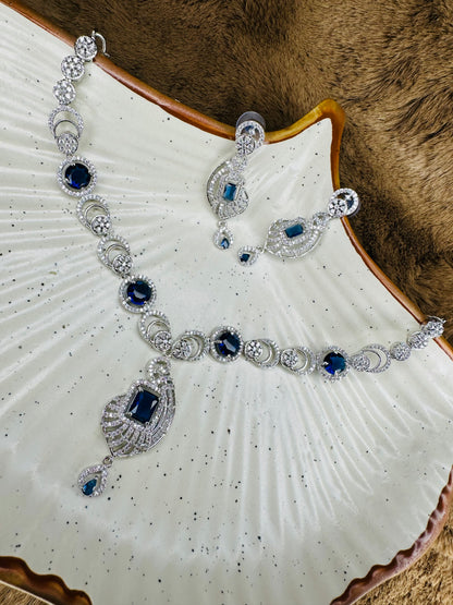 Model Wearing HeyBae American Diamond Necklace & Earrings in Blue and Green