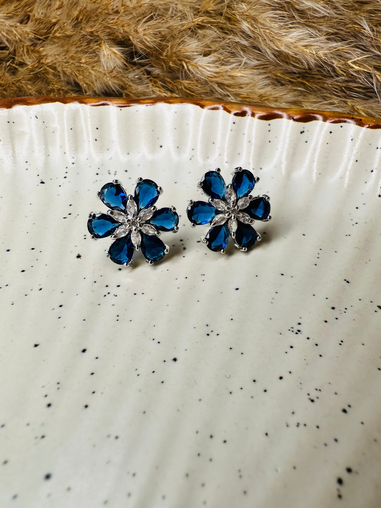 Front view of HeyBae Elegant AD Stone Flower Earrings