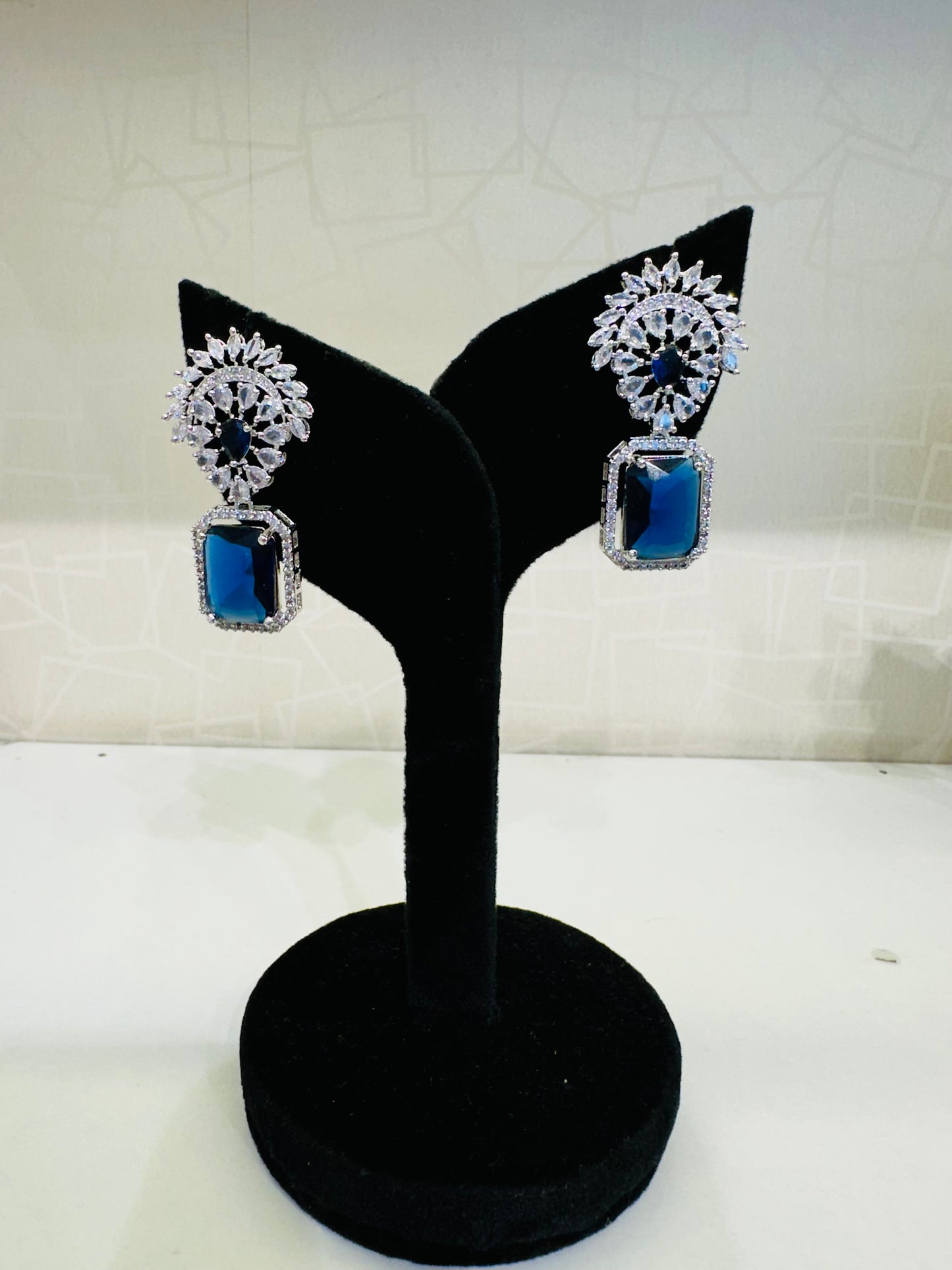 Front view of HeyBae Elegant AD Stud Drop Stone Earrings