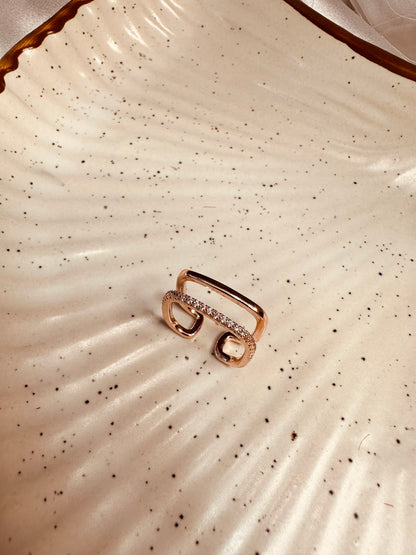 Top flat lay of HeyBae Adjustable AD Studded Ring – anti-tarnish stainless steel ring with brilliant American Diamonds
