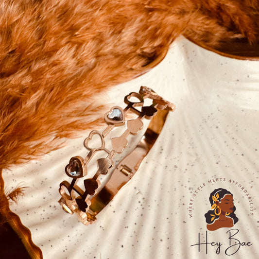 Close-up of HeyBae Anti-Tarnish Double Heart Layer Bracelet with gold plated heart design