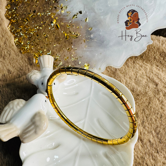 Close-up of HeyBae Anti-Tarnish Gold Bangle with premium polish and durable shine