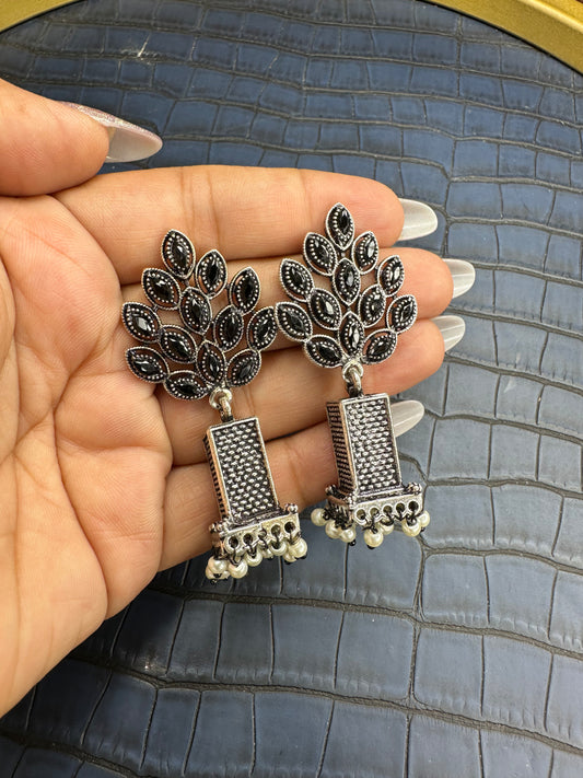 Flatlay Display of HeyBae Big Oxidised Earrings on White