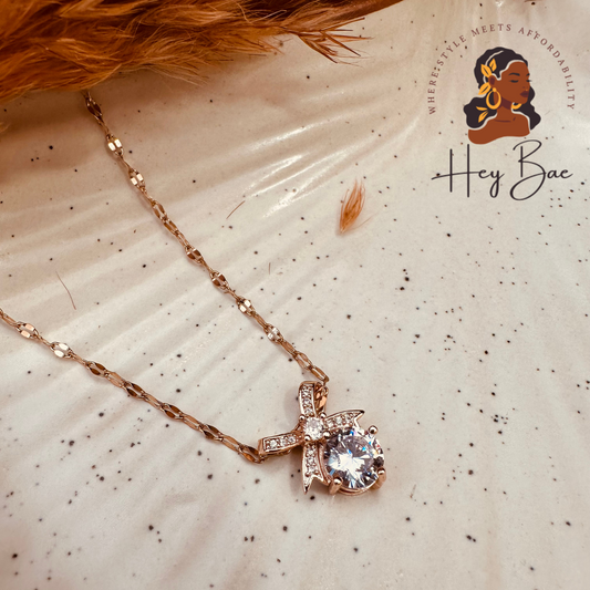 Front view of HeyBae American Diamond Bow Pendant Necklace