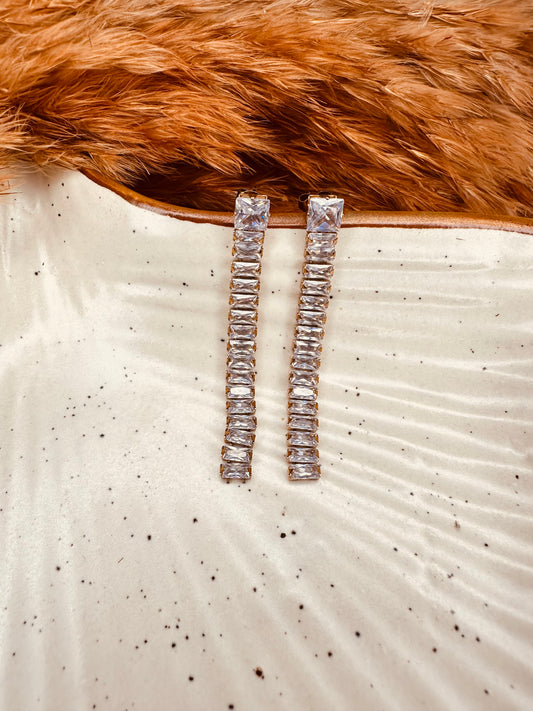 Side Look of HeyBae Long Crystal Dangler Earrings in Gold-Tone Finish