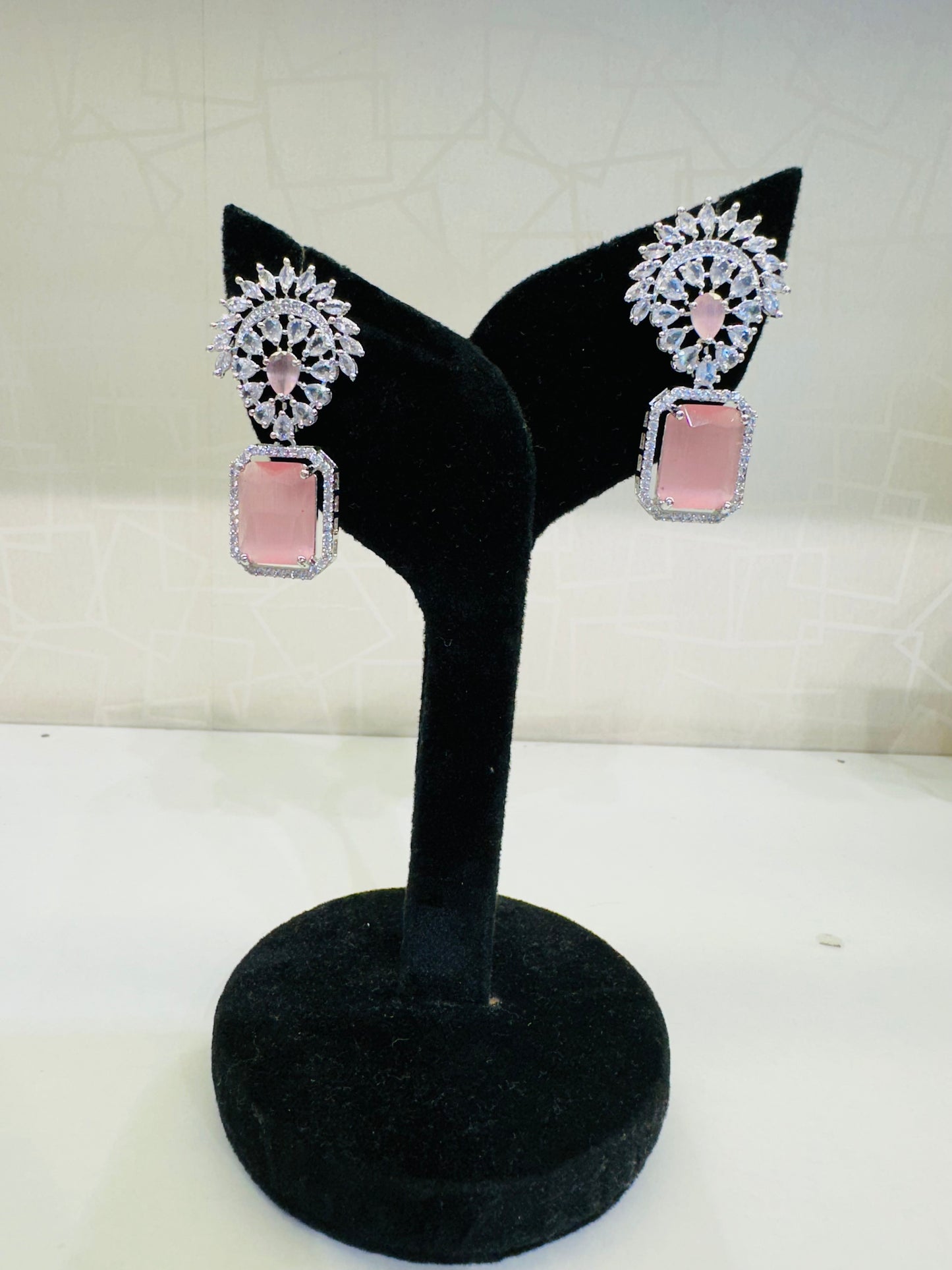 Close-up design of HeyBae AD Stud Drop Earrings with sparkling stones