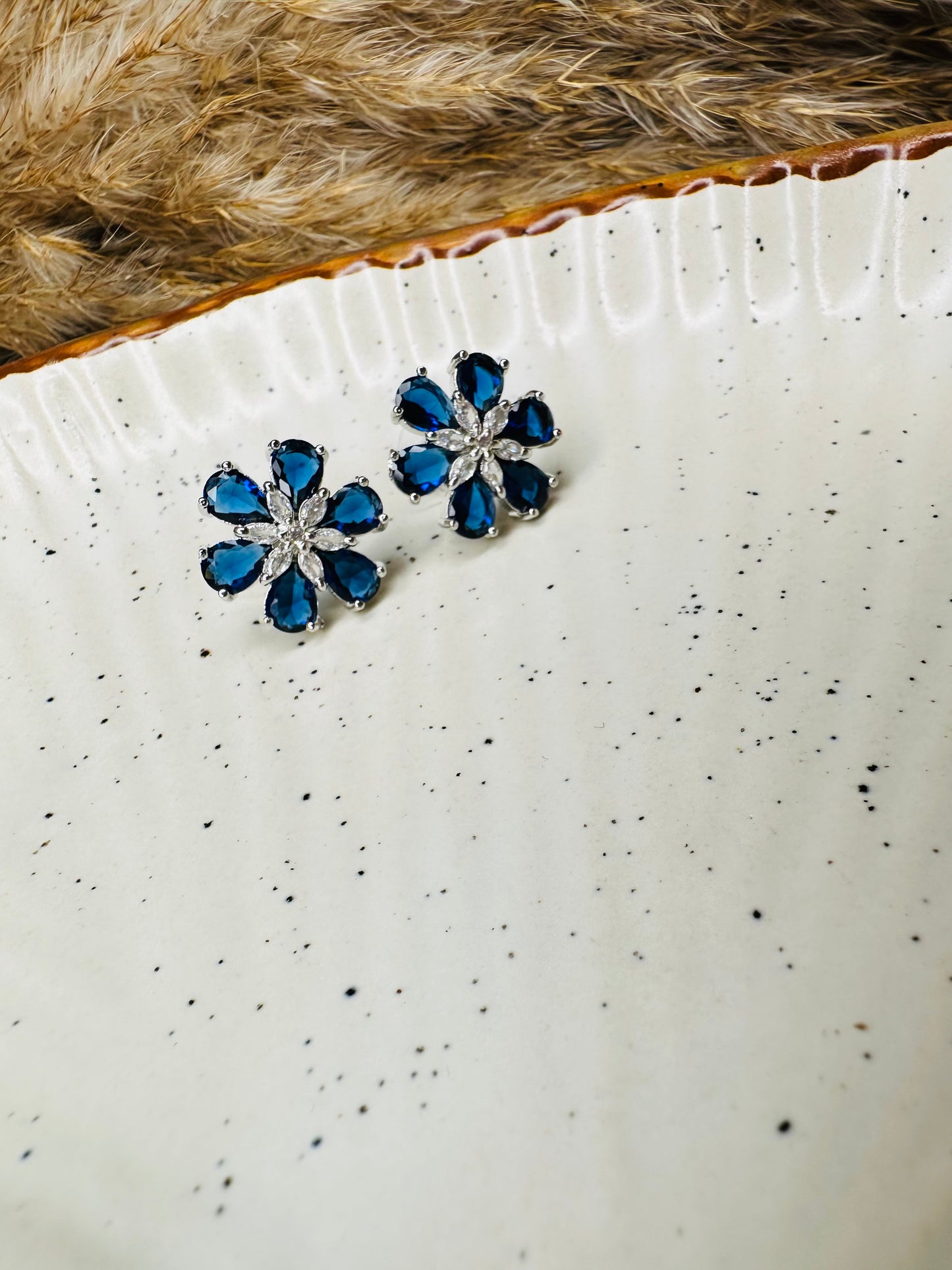 Model wearing HeyBae Elegant AD Stone Flower Earrings