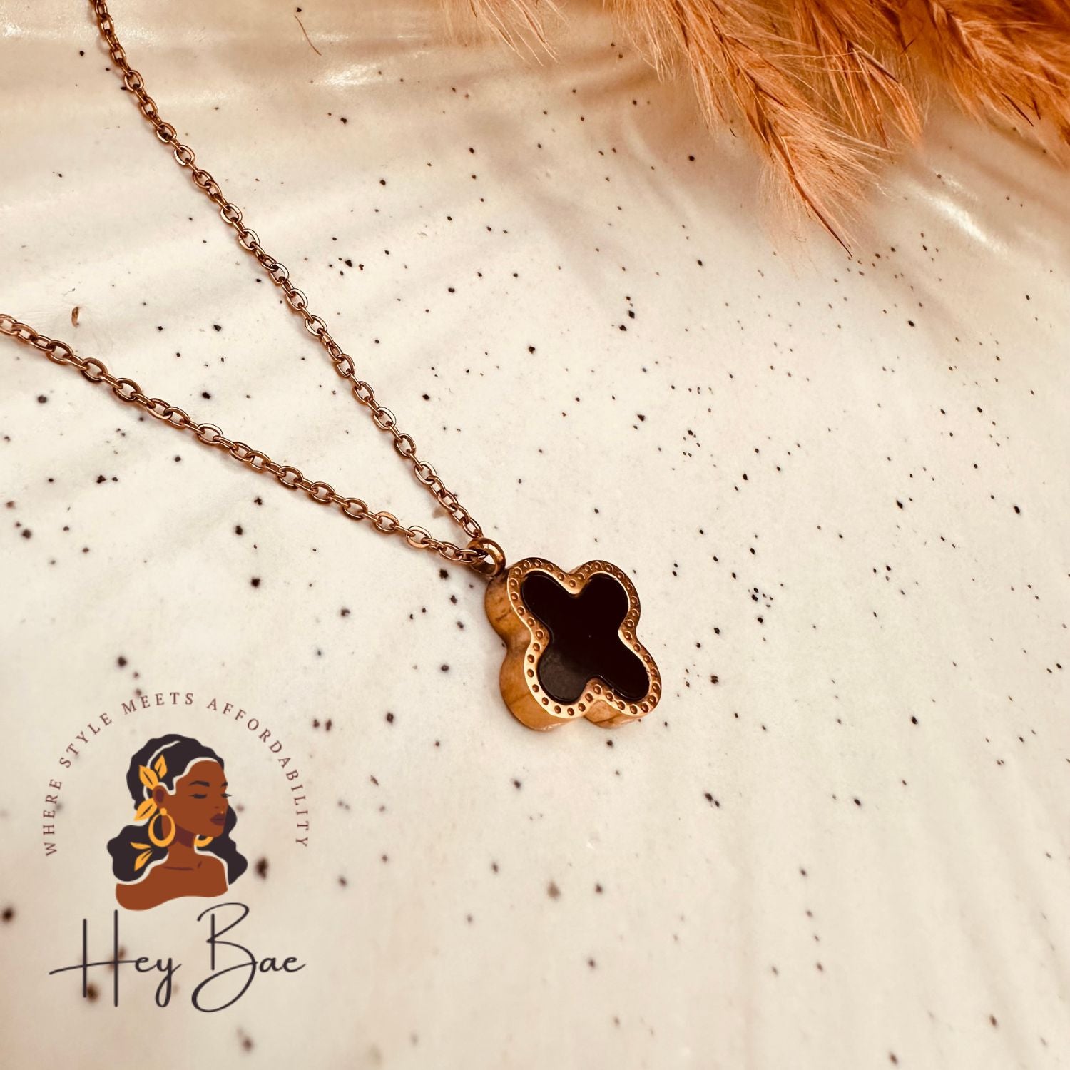 Side angle of HeyBae Four Leaf Clover Pendant Necklace in Stainless Steel