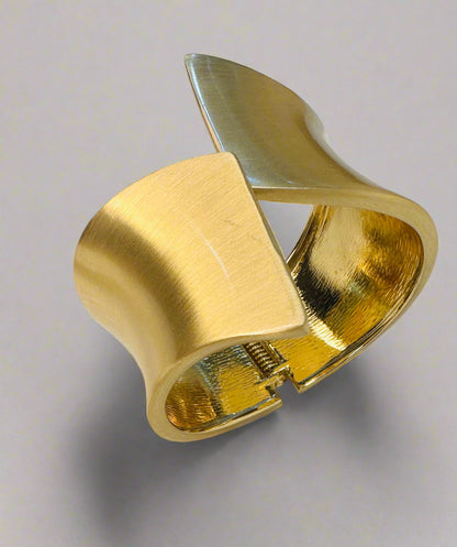 Geometric gold cuff bracelet paired with saree and lehenga for ethnic styling