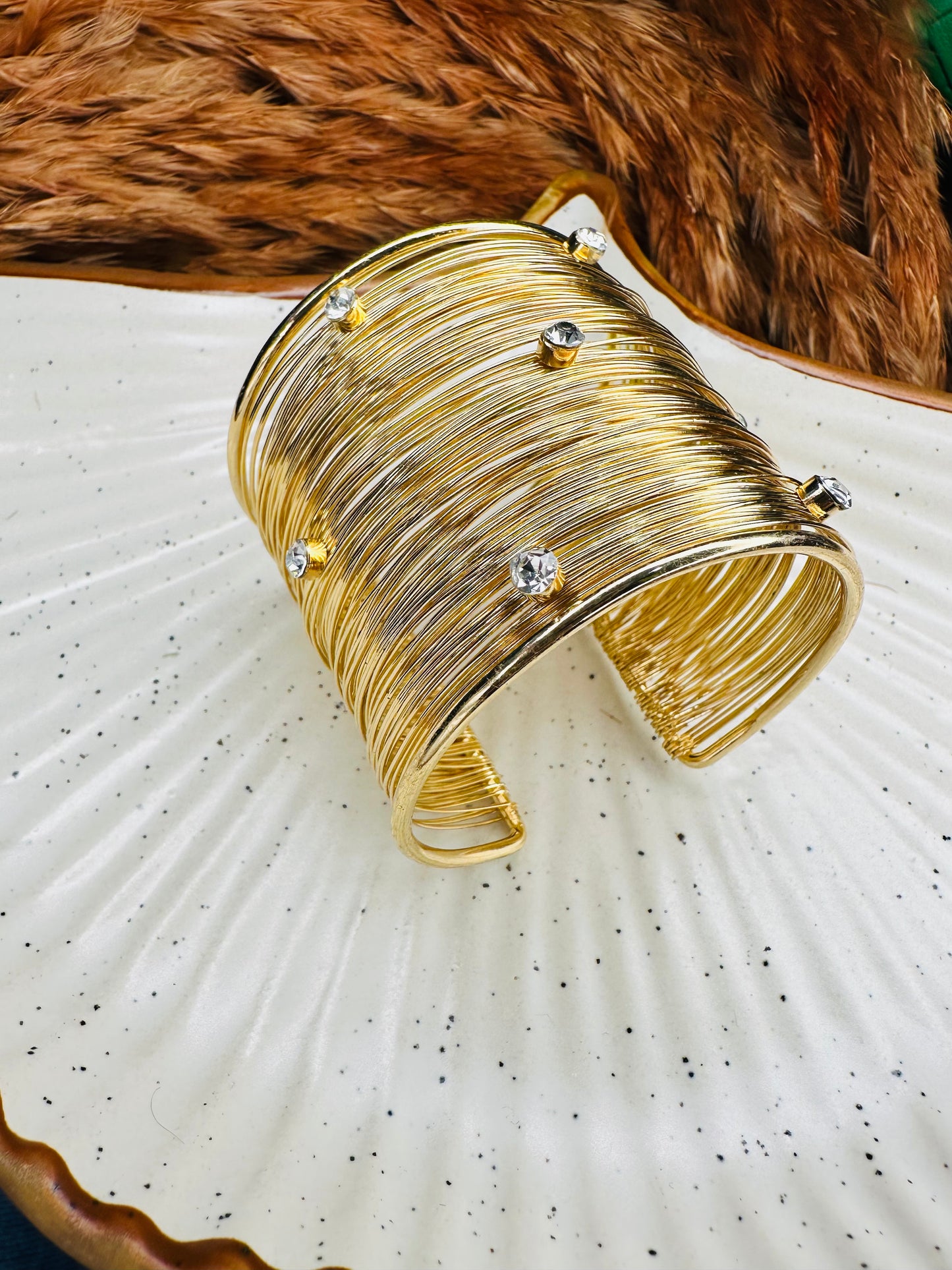 Gold cuff bracelet set styled with festive ethnic outfit