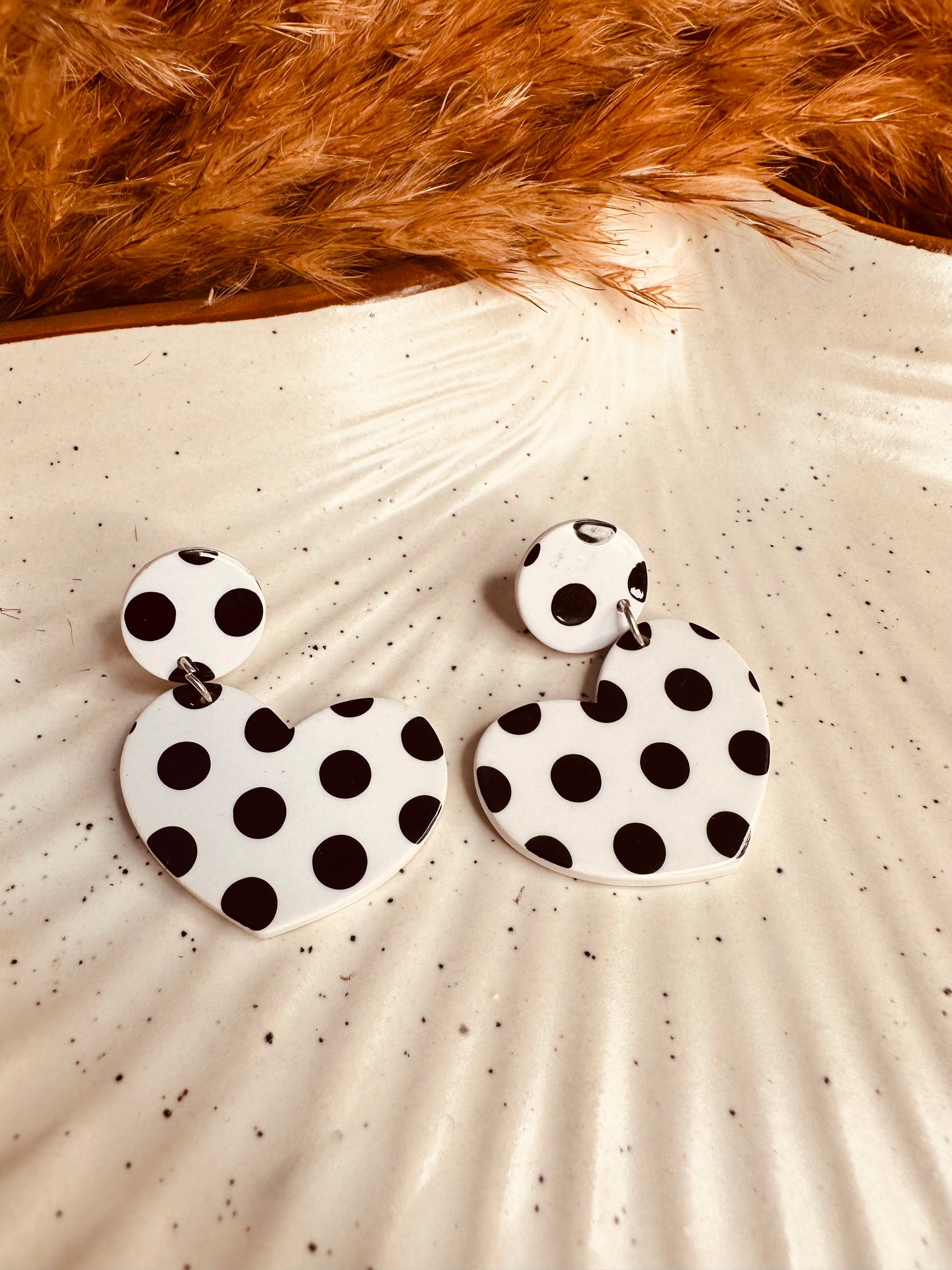 Close-up Detailing of HeyBae Polka Dotted Heart Quirky Earrings