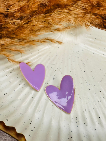 Close-up of HeyBae Purple Heart Earrings with Glossy Finish and Bold Design