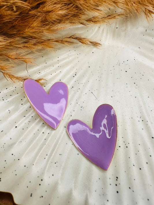Model Wearing HeyBae Purple Heart Statement Earrings with Trendy Outfit