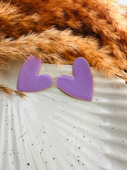 Side Angle of HeyBae Purple Heart Statement Earrings Showing Unique Shape
