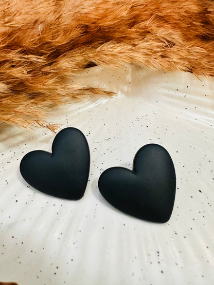 Close-up Detailing of HeyBae Purple Heart Statement Earrings with Glossy Finish