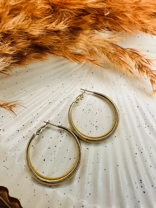Round gold hoop earrings lightweight and comfortable for daily wear