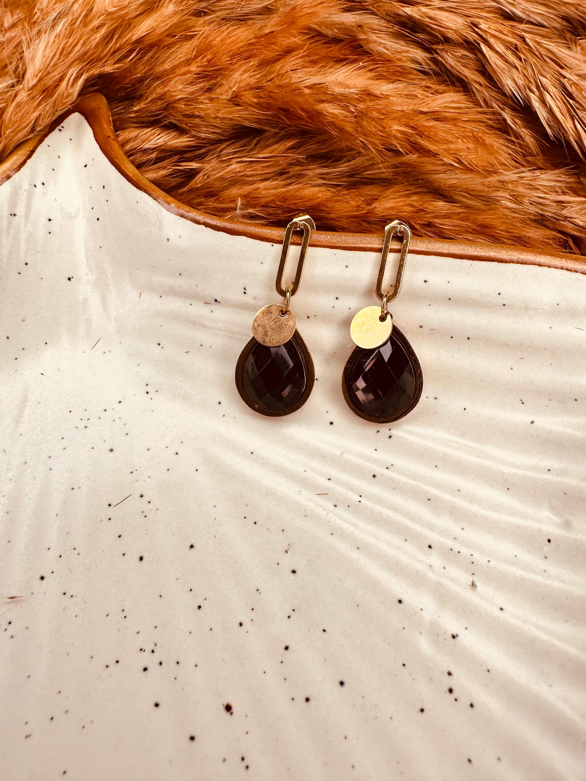 Trendy black and gold drop earrings perfect for parties