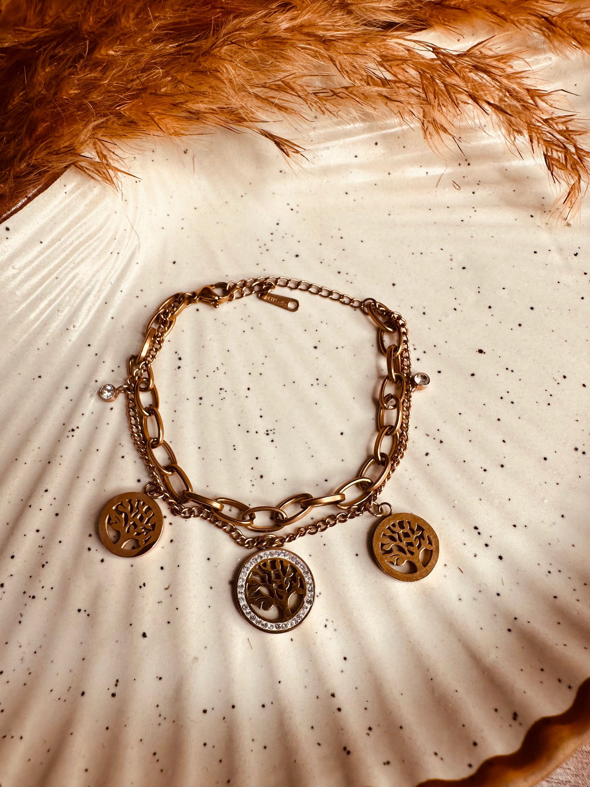 Trendy gold charm bracelet for daily wear and festive occasions