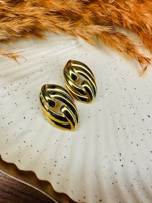 Stylish Side Look of HeyBae Gold-Tone Twisted Oval Hoop Earrings